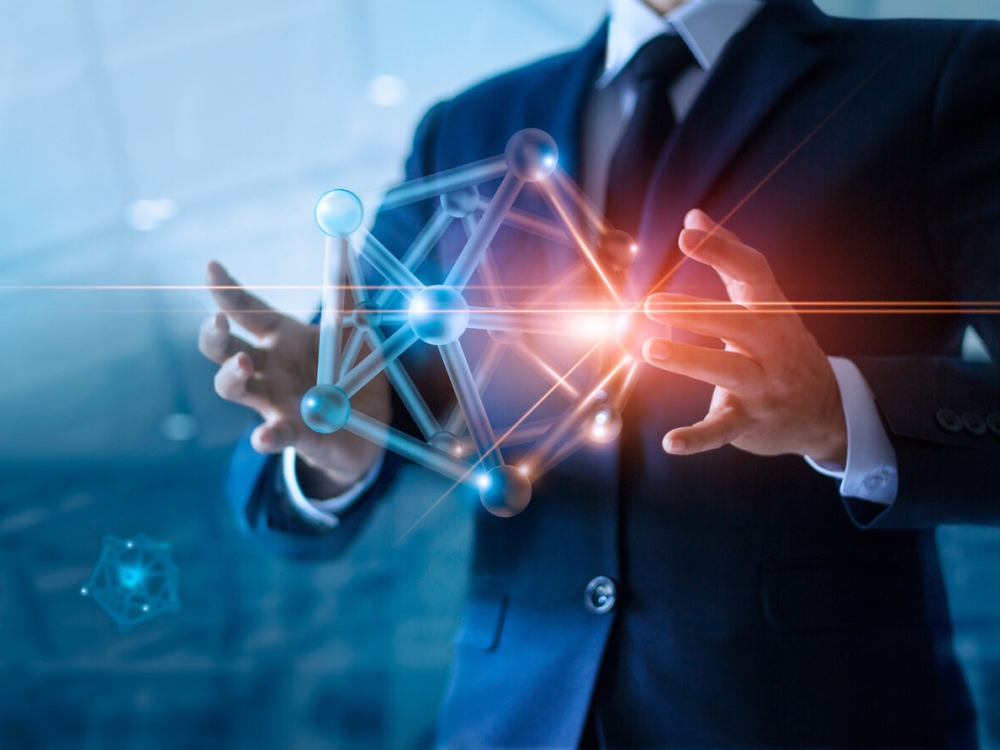 Businessman holding abstract digital networking structure on global network connection and data exchanges worldwide, Business network communication and technology concept.